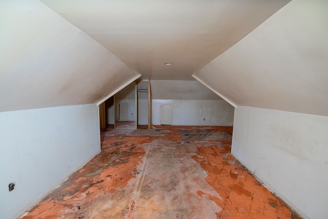 bonus room featuring lofted ceiling