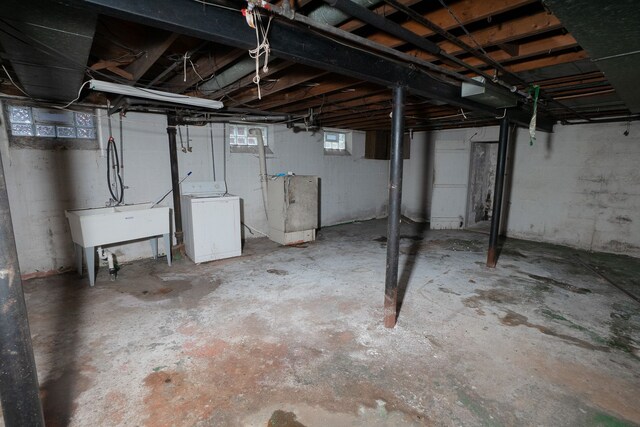 16226 Mark Twain St, Detroit, MI 48235 - basement featuring washer / dryer and a sink