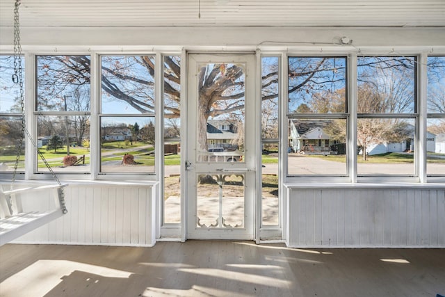 doorway to outside featuring hardwood / wood-style flooring