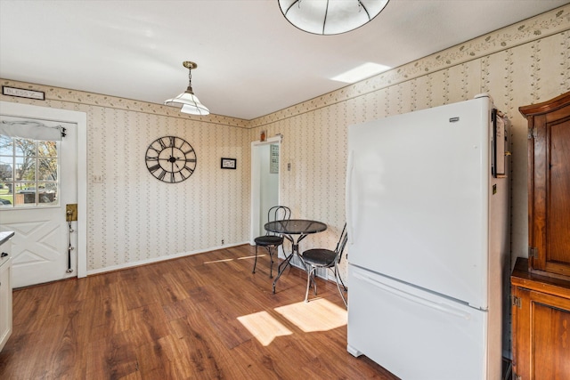 dining room with dark wood-type flooring