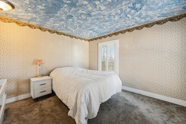 bedroom featuring dark colored carpet