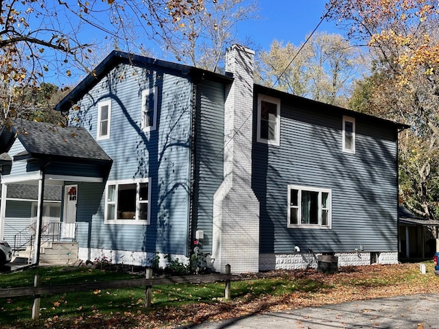 view of home's exterior with covered porch