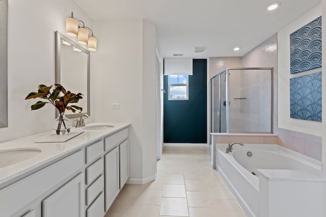 full bath featuring a garden tub, tile patterned flooring, a sink, double vanity, and a stall shower