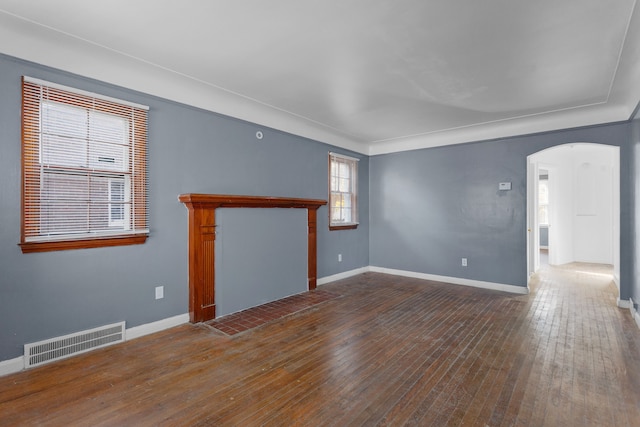 empty room featuring dark wood-type flooring