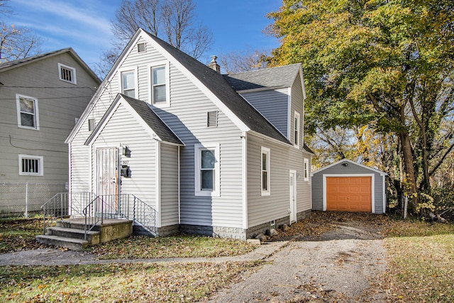 view of front of house featuring an outbuilding and a garage