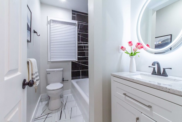 bathroom featuring vanity, toilet, and a bath