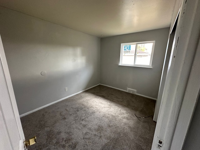 25741 Champaign St, Taylor, MI 48180 - unfurnished bedroom featuring carpet and baseboards