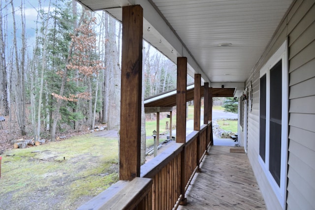 wooden terrace featuring a porch