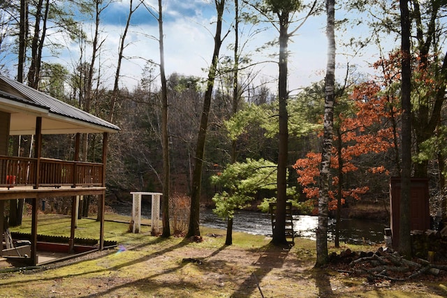 view of yard with a water view