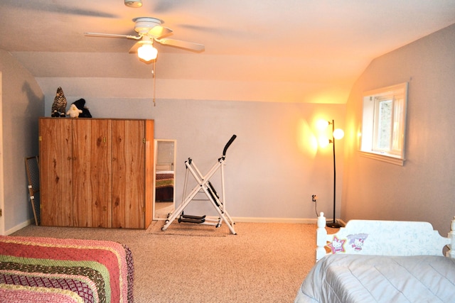 bedroom featuring carpet floors, ceiling fan, and lofted ceiling