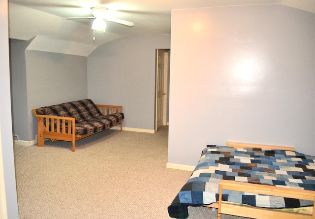 bedroom with light carpet, ceiling fan, and lofted ceiling