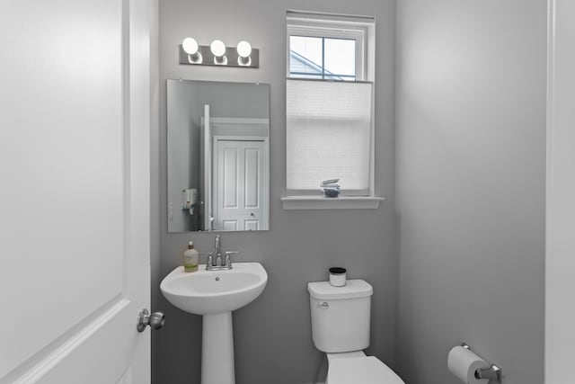 bathroom featuring toilet