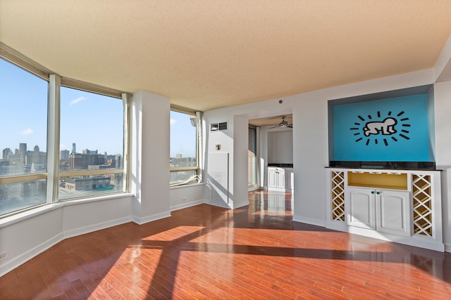 interior space with ceiling fan