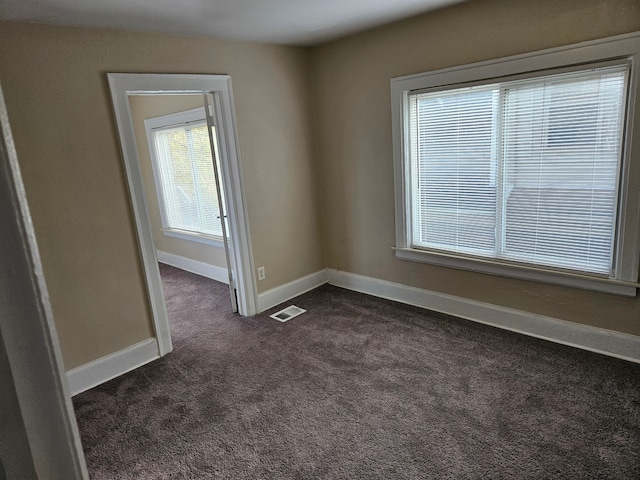 view of carpeted spare room