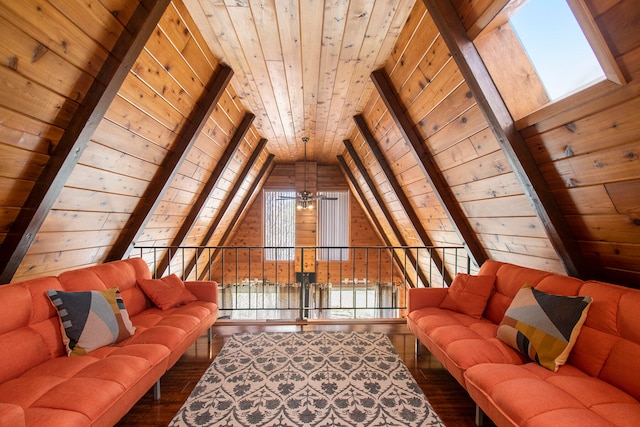 living room with hardwood / wood-style floors, beamed ceiling, wood ceiling, and an inviting chandelier