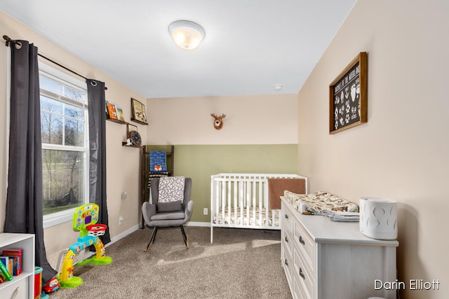 carpeted bedroom with a crib