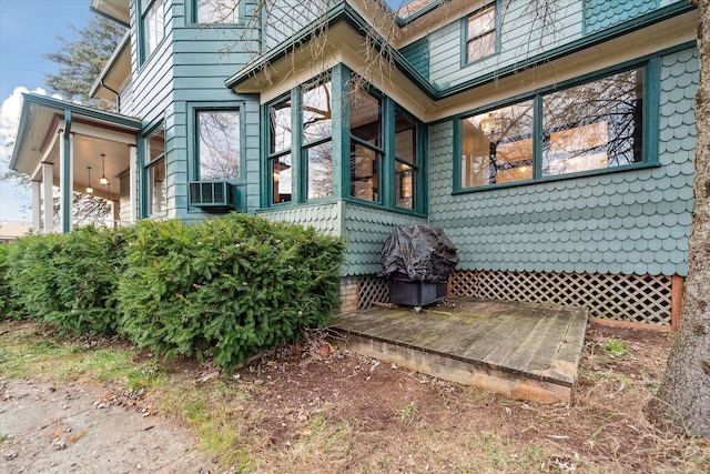 view of home's exterior with cooling unit