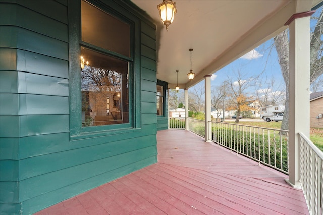 wooden terrace with covered porch