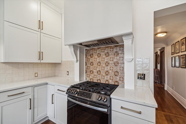 kitchen with white cabinetry, light stone counters, dark hardwood / wood-style floors, backsplash, and black range with gas cooktop