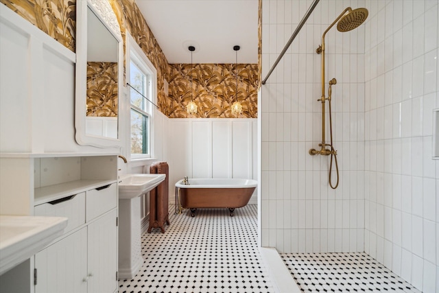 bathroom featuring separate shower and tub