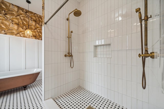 bathroom featuring separate shower and tub