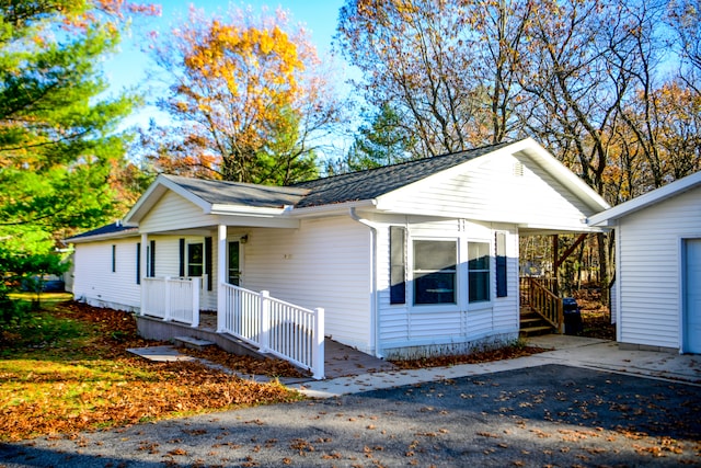 view of home's exterior featuring covered porch