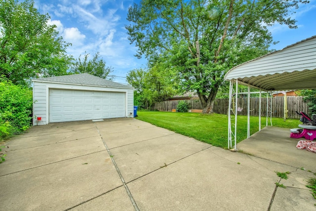 garage featuring a lawn