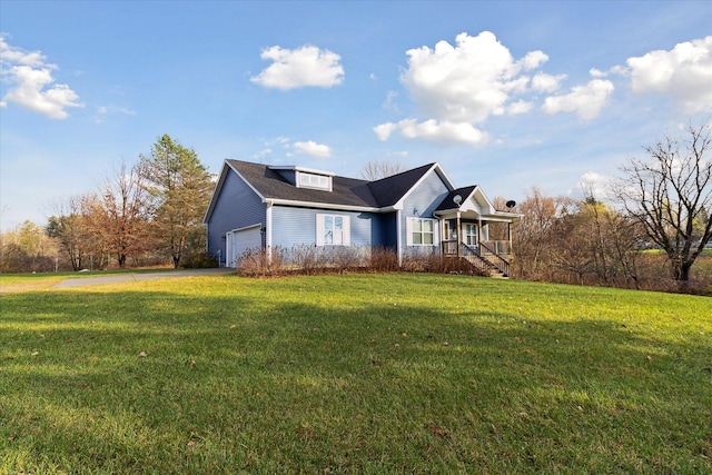 view of home's exterior with a yard and a garage