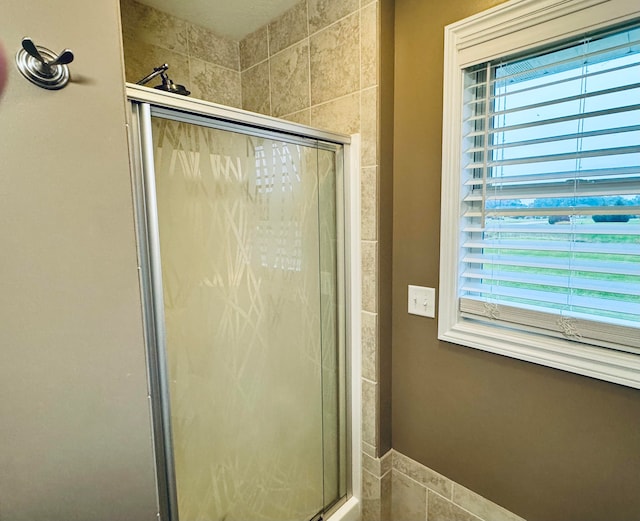 bathroom featuring walk in shower