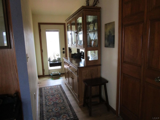 hallway featuring light wood-type flooring