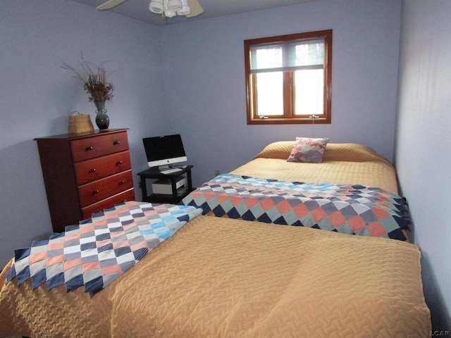 bedroom featuring ceiling fan