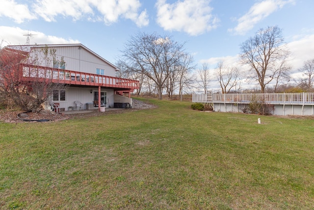 view of yard with a wooden deck