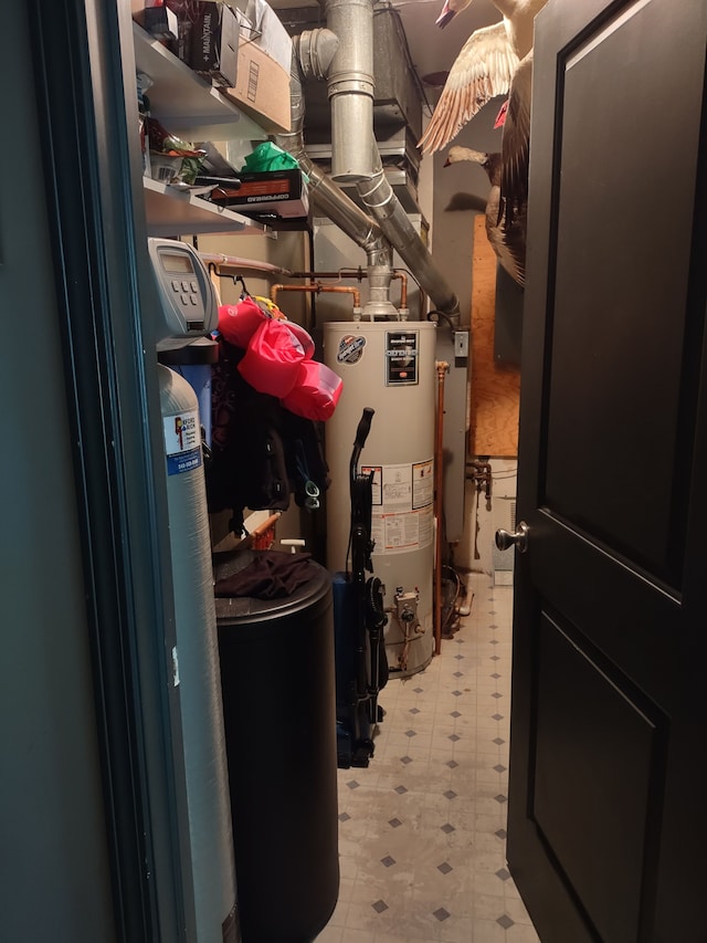 utility room featuring gas water heater