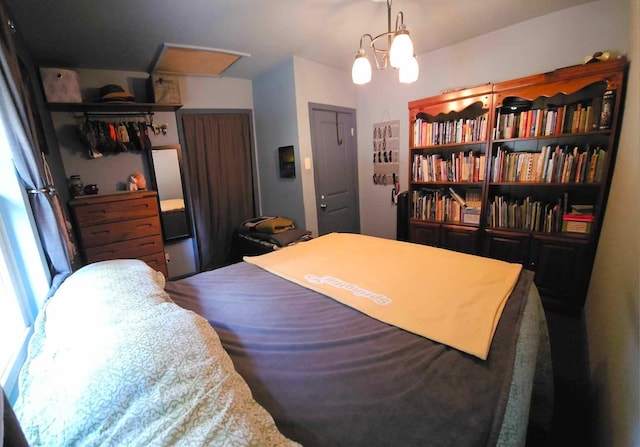 bedroom with an inviting chandelier