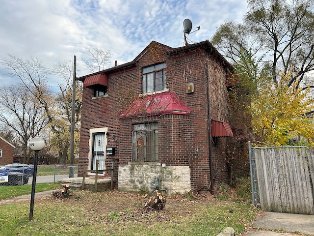 12644 Corbett St, Detroit, MI 48213 - view of front facade featuring brick siding