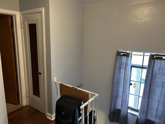 interior space with dark hardwood / wood-style floors