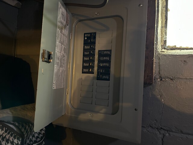 12644 Corbett St, Detroit, MI 48213 - utility room featuring electric panel
