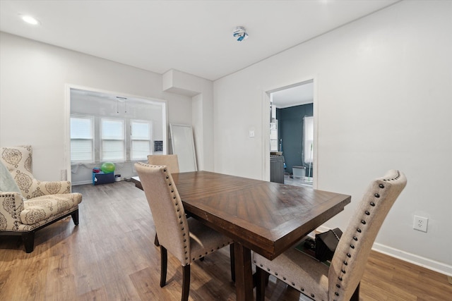 dining area featuring hardwood / wood-style floors