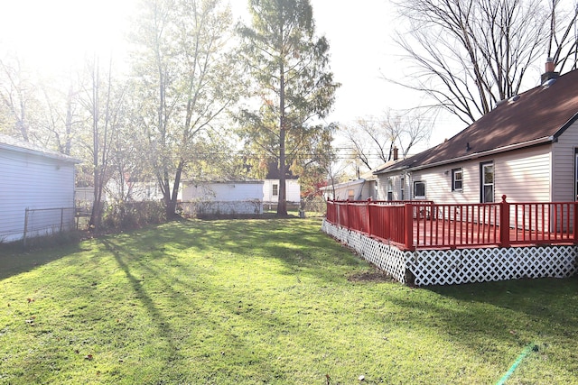 view of yard with a wooden deck