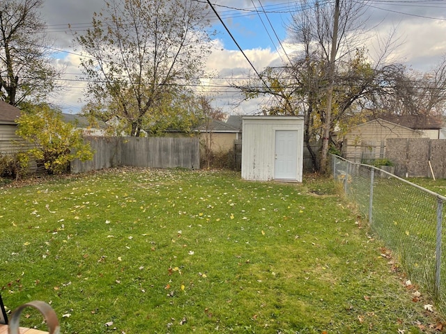 view of yard with a storage shed