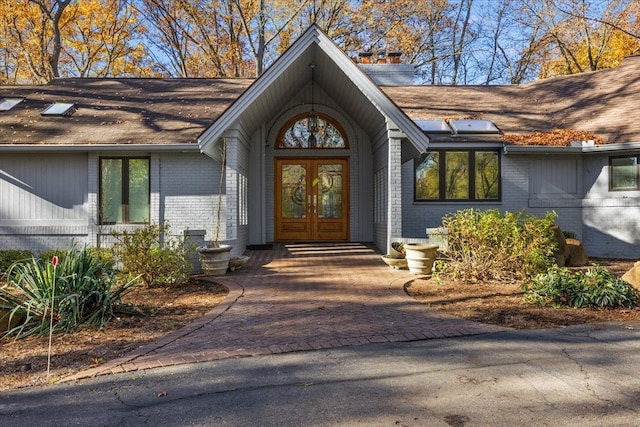 entrance to property with french doors