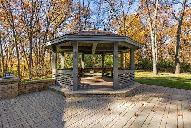 view of community featuring a gazebo and a lawn