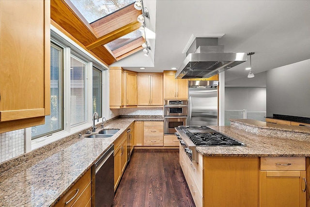 kitchen with lofted ceiling with skylight, ventilation hood, sink, light stone countertops, and appliances with stainless steel finishes