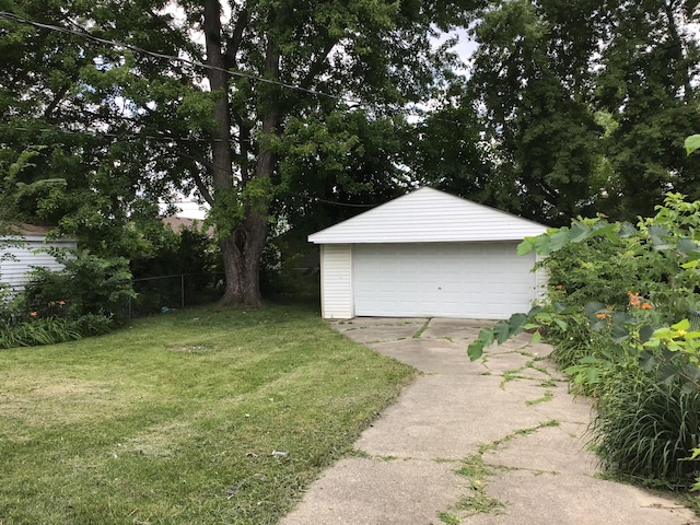 garage with a yard