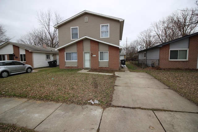 view of front of property with a front lawn