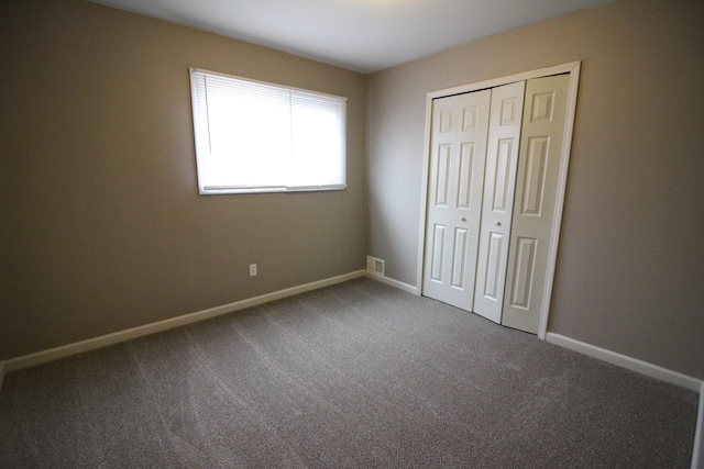 16117 Jackson St, Taylor, MI 48180 - unfurnished bedroom featuring carpet and a closet