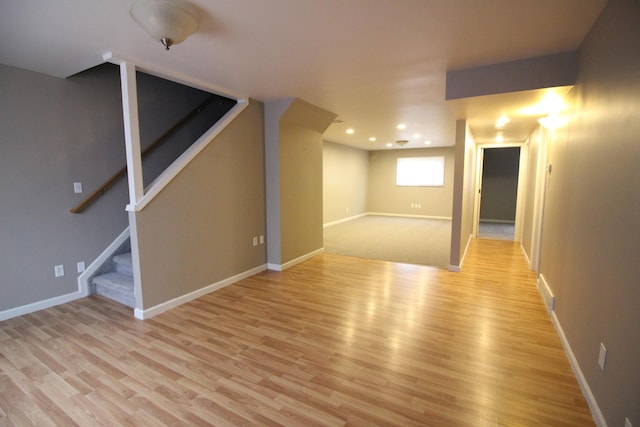 16117 Jackson St, Taylor, MI 48180 - basement with light wood-style flooring, stairs, baseboards, and recessed lighting