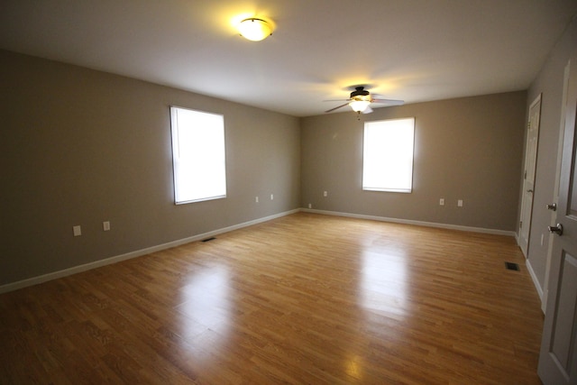 16117 Jackson St, Taylor, MI 48180 - spare room with hardwood / wood-style floors and ceiling fan