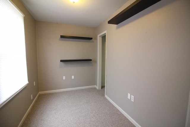 16117 Jackson St, Taylor, MI 48180 - carpeted empty room with baseboards