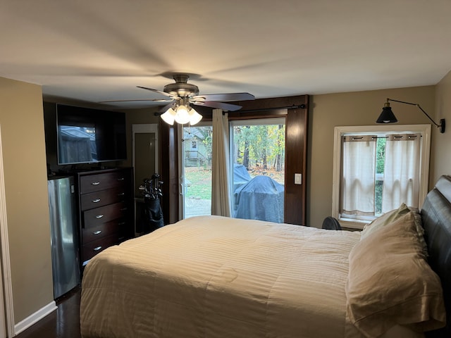 bedroom with ceiling fan and access to outside